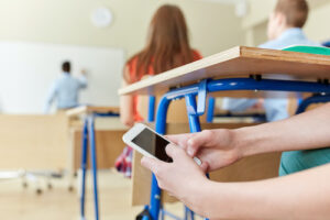 Texting has become a commonplace activity in students’ lives, but it is throttling students' writing ability and ability to think critically.